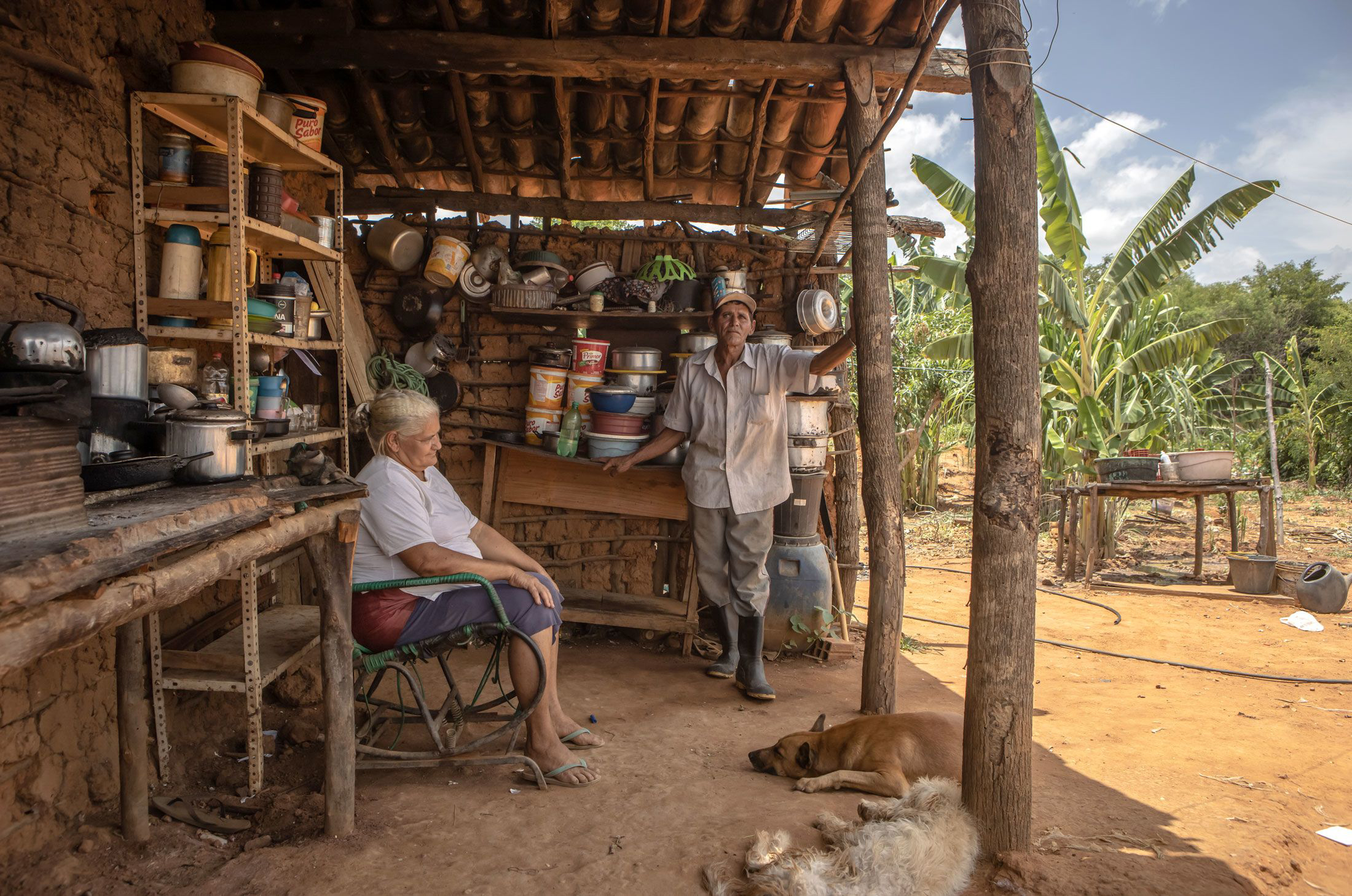 Francisca Vieira Gomes and her husband, Paulo Sergio Ferreira, outside their home in Brazil's northeast state of Ceara. MUST CREDIT: Bloomberg photo by Jonne Roriz.