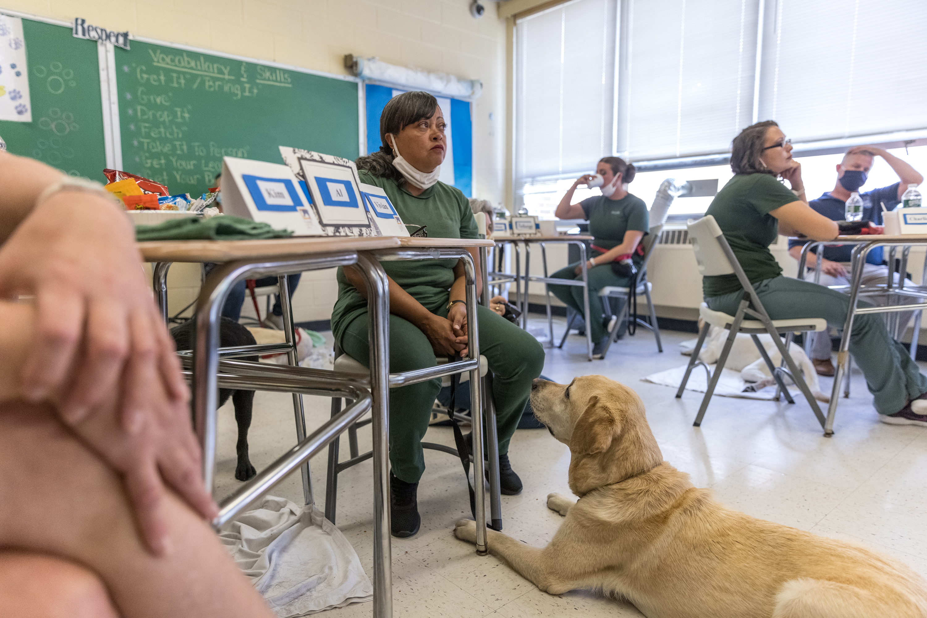 Vivian Rodgriguez participates during the training at Bedford Hills Correctional Facility, a maximum security women's prison. Police agencies nationwide, including the New York Police Department, are using therapy dogs to help officers alleviate job-related stress. MUST CREDIT: Photo by Jeenah Moon for The Washington Post.