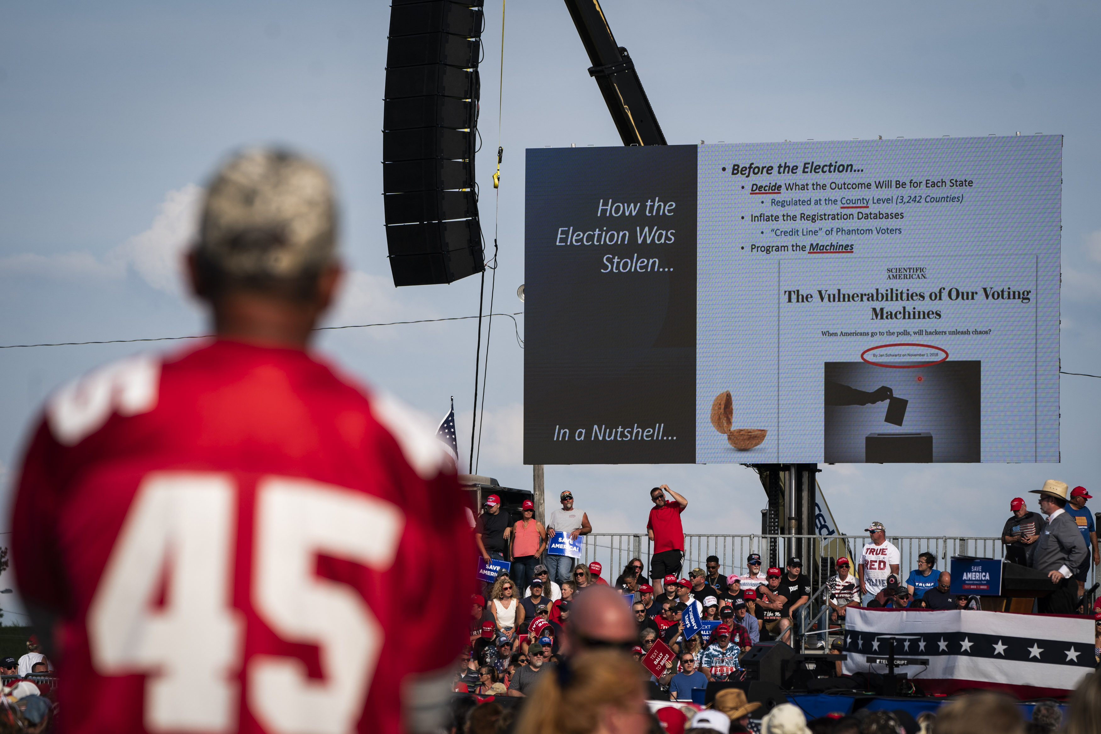 Trump supporters at a rally June 26 in Wellington, Ohio, watch a presentation by longtime Ohio teacher Douglas Frank, who claims to have discovered secret algorithms used to rig the 2020 election. MUST CREDIT: Washington Post photo by Jabin Botsford