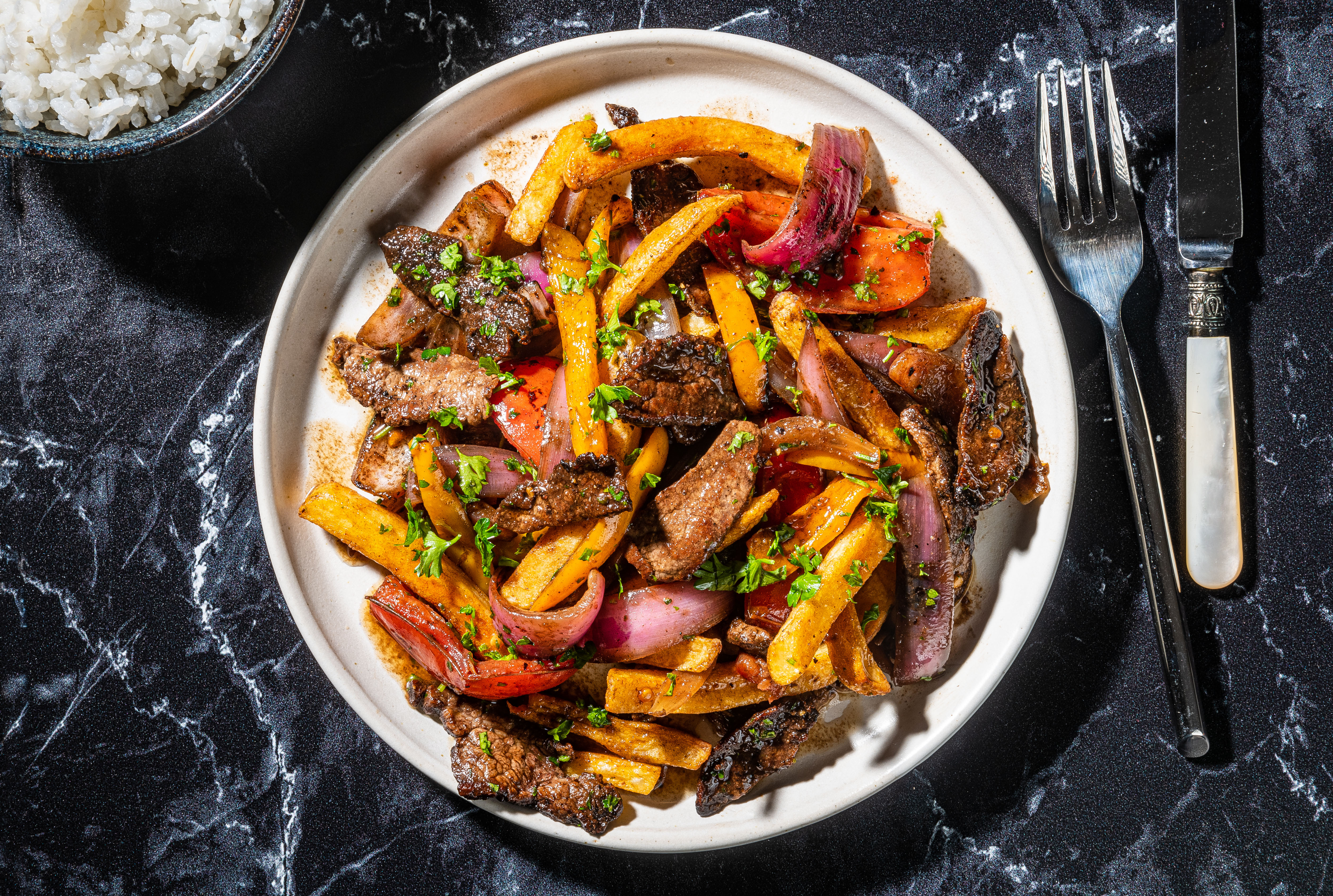 How to make lomo saltado, a craveable Peruvian stir-fry - Vimarsana News